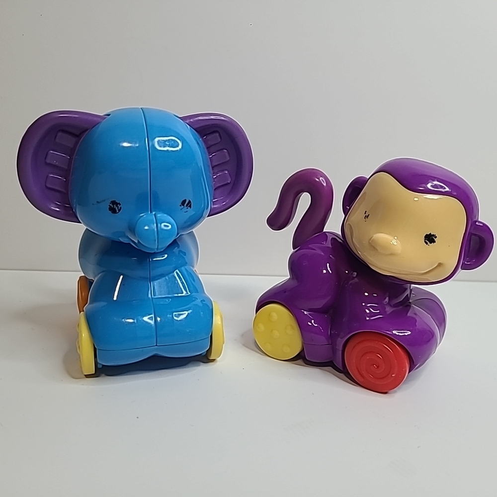 Fisher Price Amazing Animals Spinnin' Around Musical Zoo Elephant & Monkey